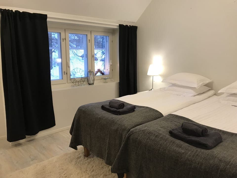 Deluxe Apartment | Living area | Flat-screen TV