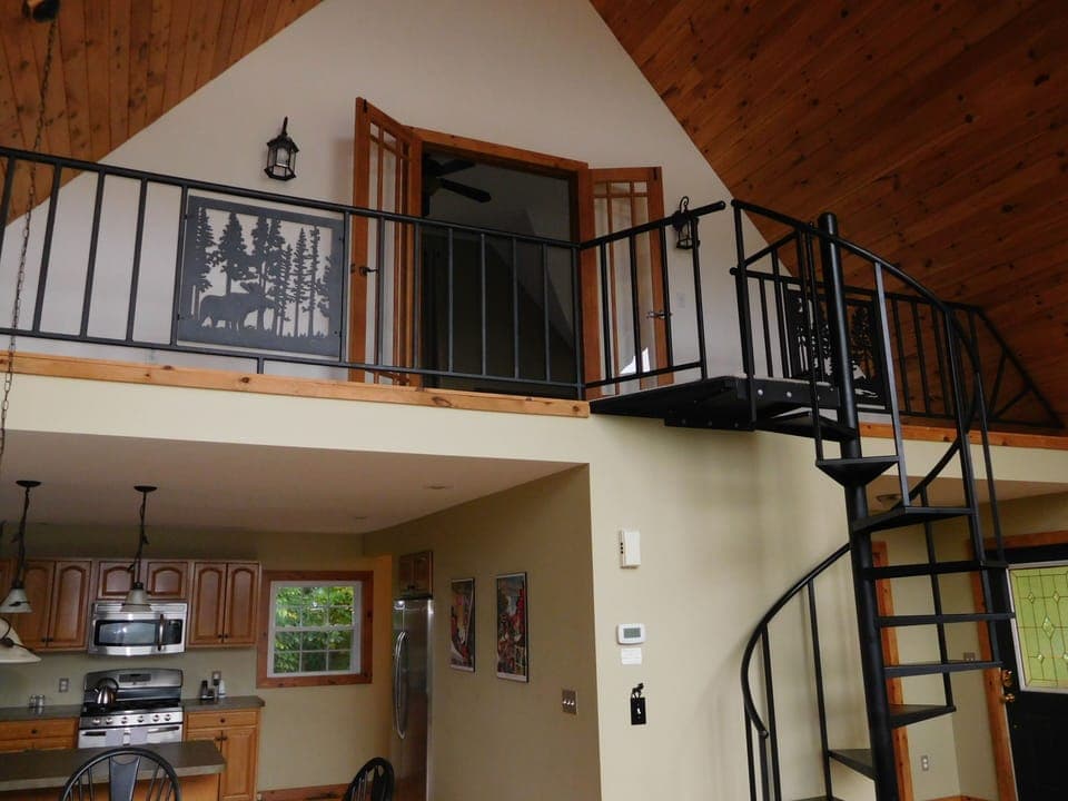 Loft upstairs leading to master bedroom and bath