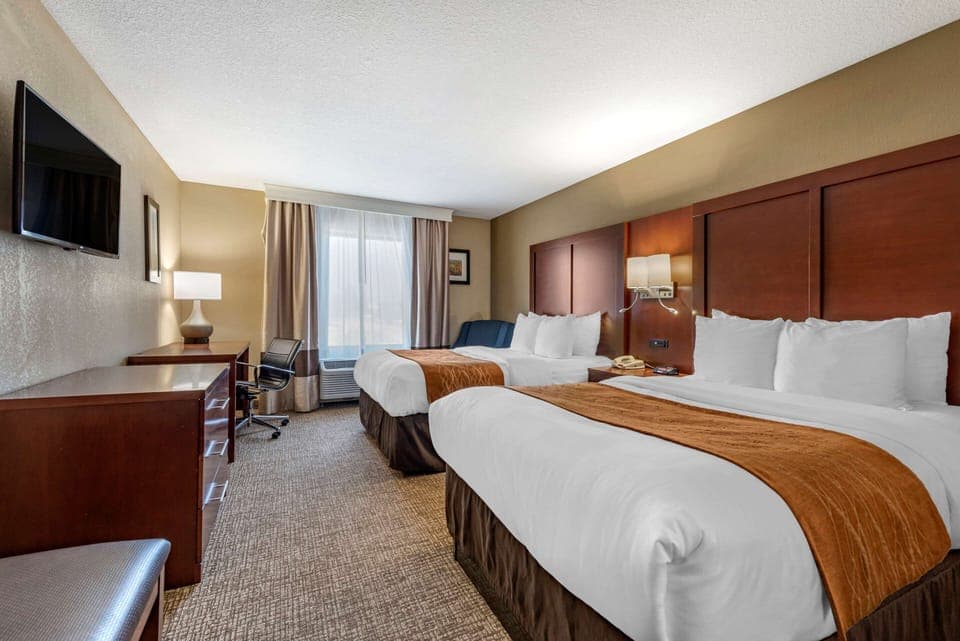 Premium bedding, pillowtop beds, desk, blackout drapes