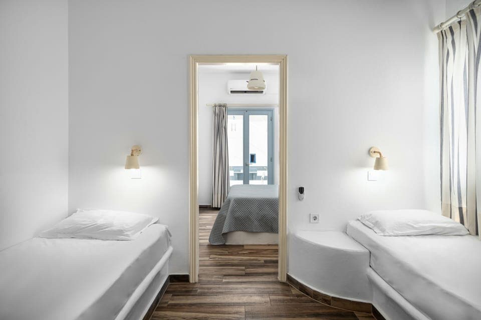 Two Bedroom Family Room with Street View | In-room safe, desk, iron/ironing board, free WiFi