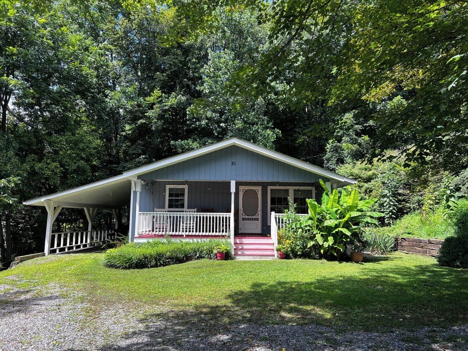 Nestled against the woods, cozy and private.