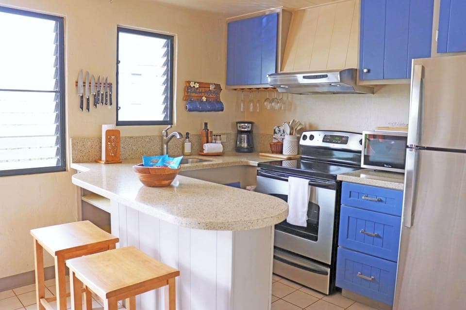 Kitchen is fully equipped with pots, pans and appliances