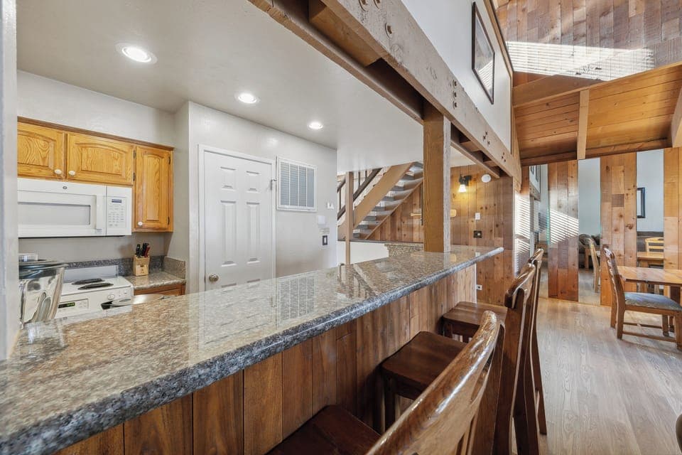 Jump up to the bar with 3 stools for quick meals