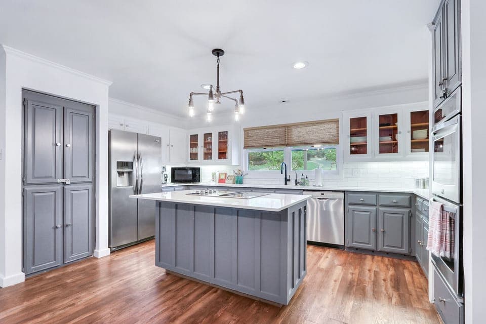 Full kitchen with stainless steel appliances