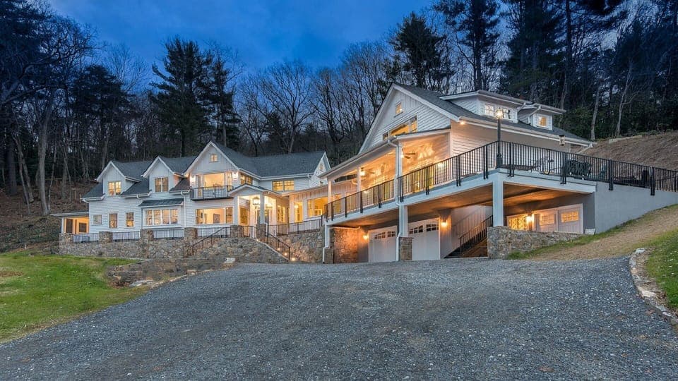 View of entire home.  Apartment stairs, patio, & covered porch on the 2nd floor.