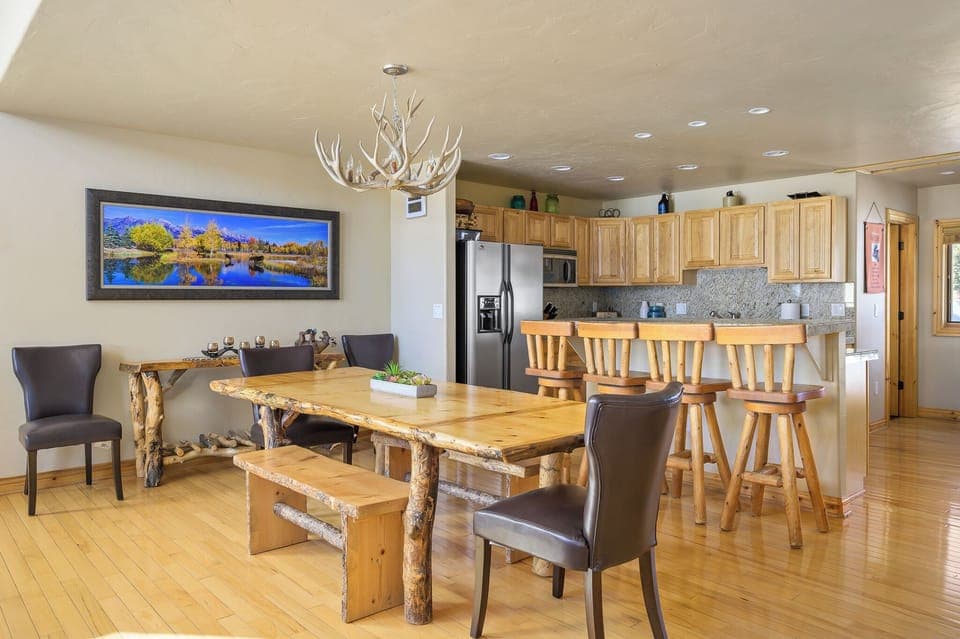 Custom log dining table seats eight