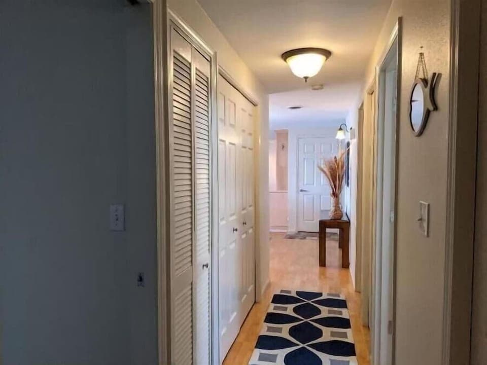 hallway with laundry closet