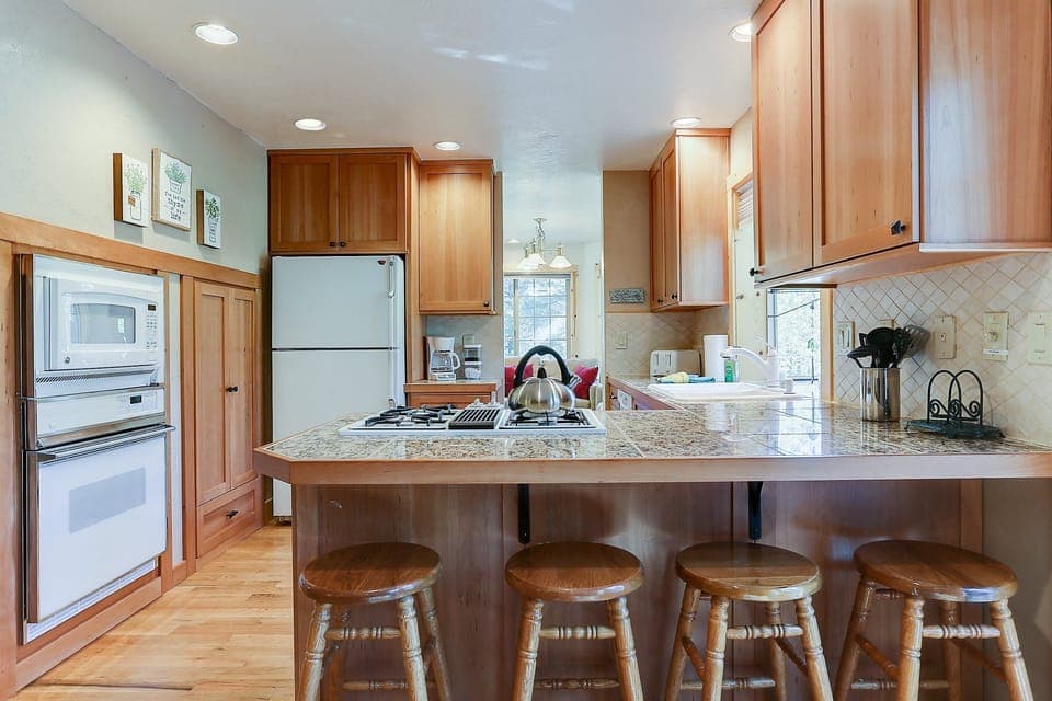 Kitchen with family room beyond