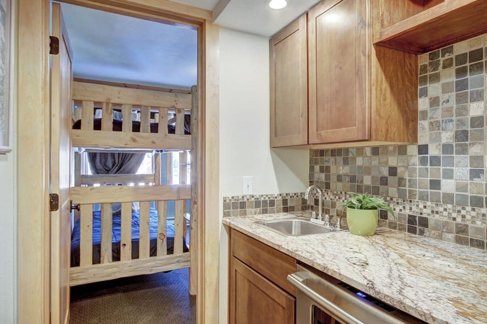 Convenient wet bar located in the lower level hallway - 4 O'Clock Lodge D26 Breckenridge Vacation Rental