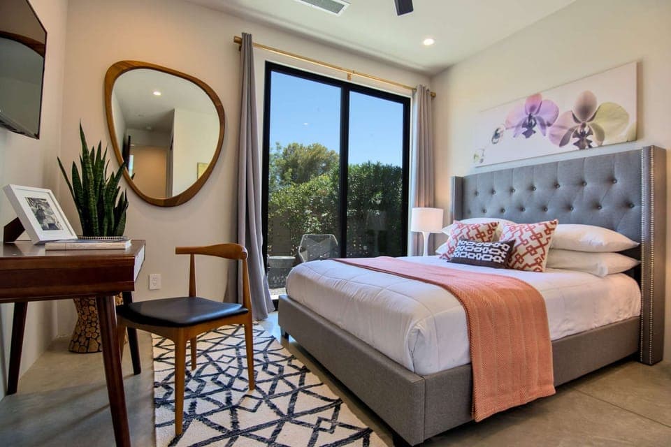 Bedroom 2 with En Suite Bath and Sliding Doors Leading to Outdoor Space