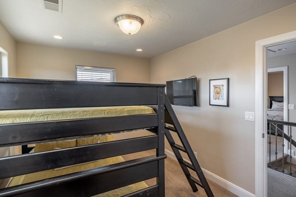 Bedroom 5 - Bedroom 5 includes Full over Full Bunk bed with private satellite TV.