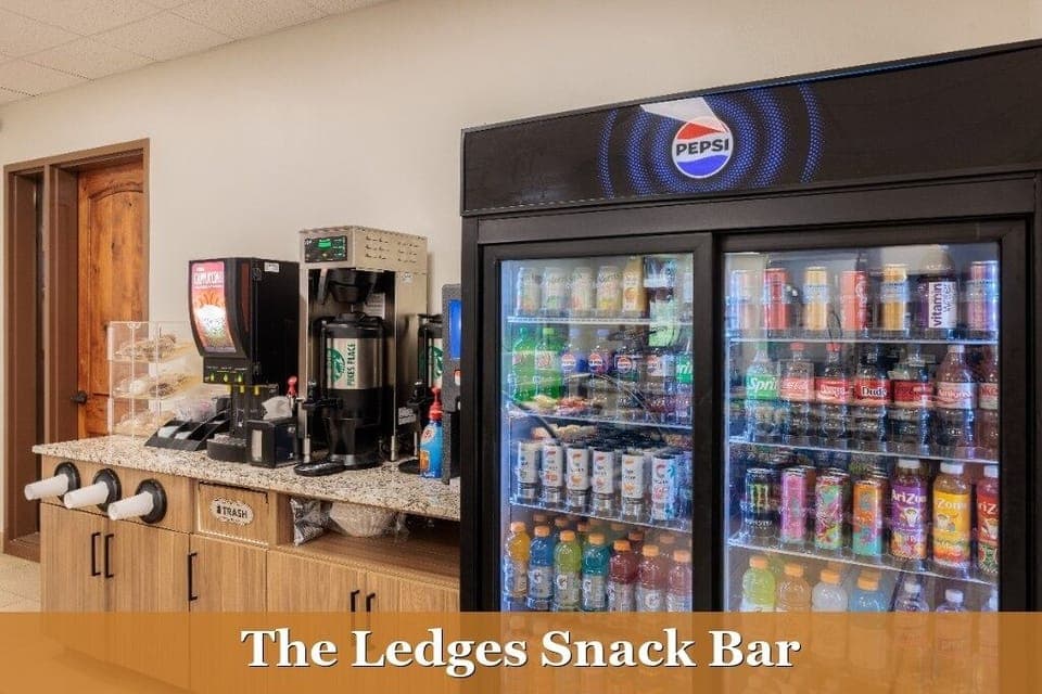 Ledges Snack Bar - Come grab a quick snack, beverage, hot dog, or hamburger at the Ledges Snack Bar located next to the driving range.