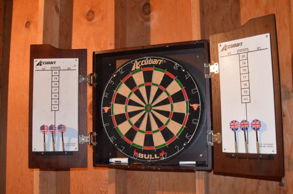 Darts and other fun games in the unfinished downstairs recreation room.