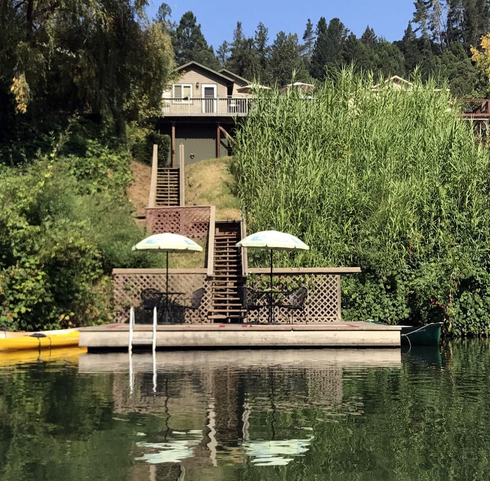 Planning for next summer? Don't wait! Idle Hour has one of the best spots on the river!  View of home and seasonal dock from the river.
