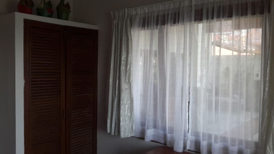 Beach Double Deluxe | Living area | 42-inch flat-screen TV with cable channels, TV