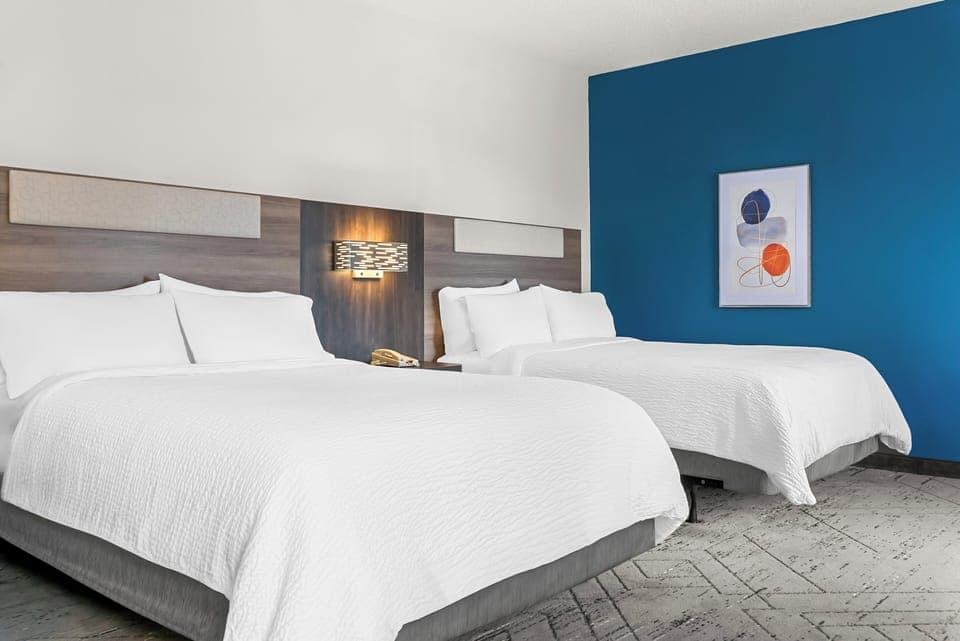 Premium bedding, pillowtop beds, desk, blackout drapes