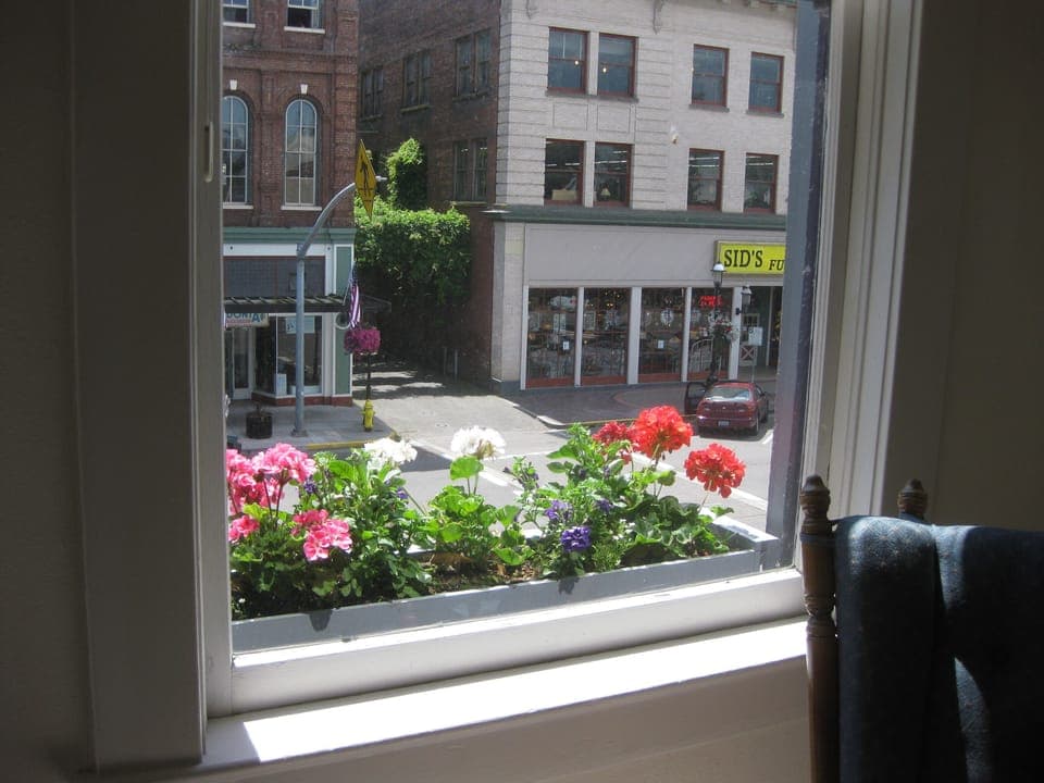 Window boxes along the front of the building  (369 Court NE).  

