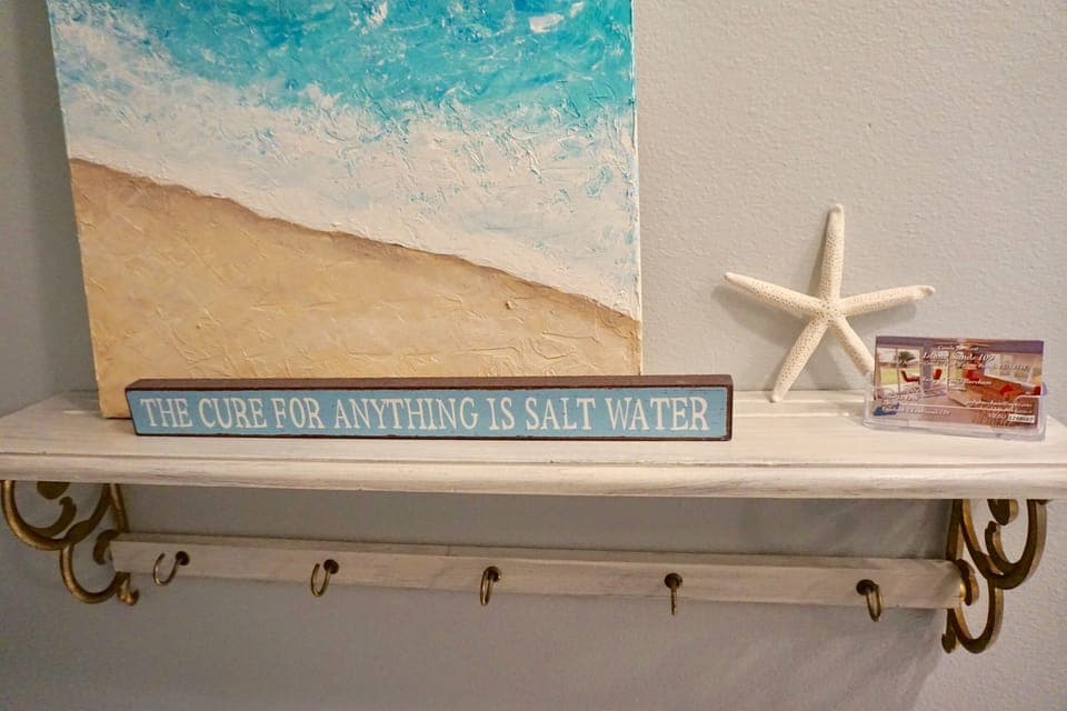 Hooks in the hall provide a convenient home for keys, hats, or other small items