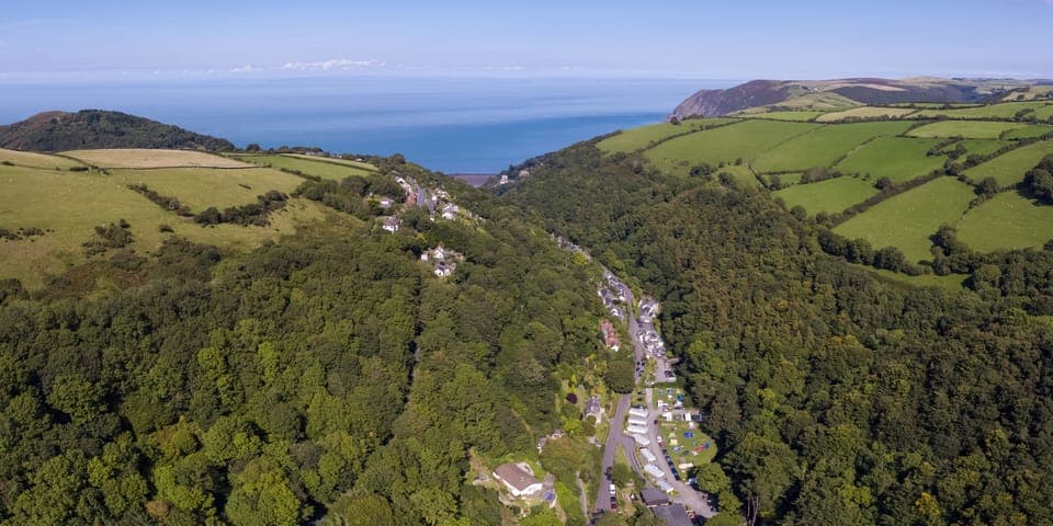 View of the Holiday Park with the towns of Lynton and Lynmouth beyond