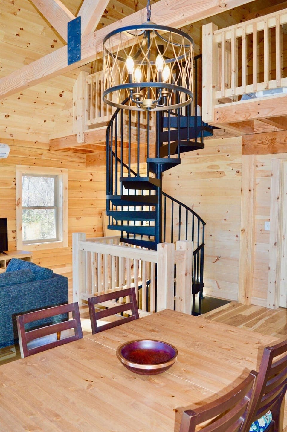 Spiral stairs to Sleeping Loft and Lower Level Bedroom Suite