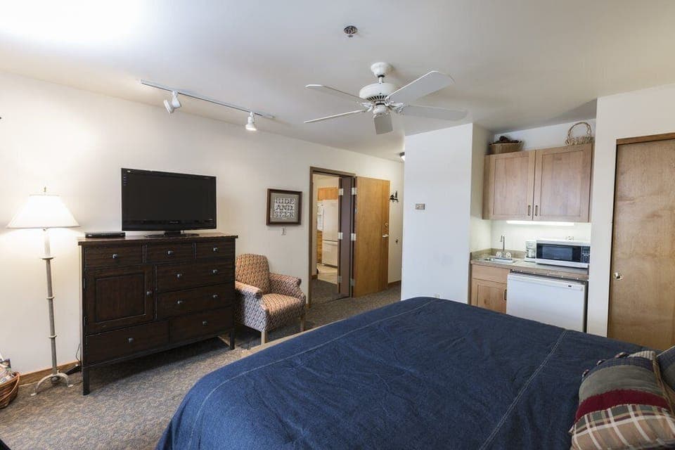 Has a wet bar with microwave, mini refrigerator, and coffeemaker.