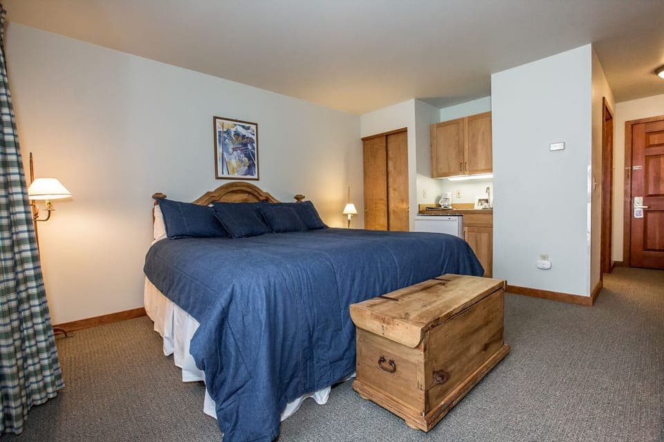 Has a wet bar with microwave, mini refrigerator, and coffeemaker.