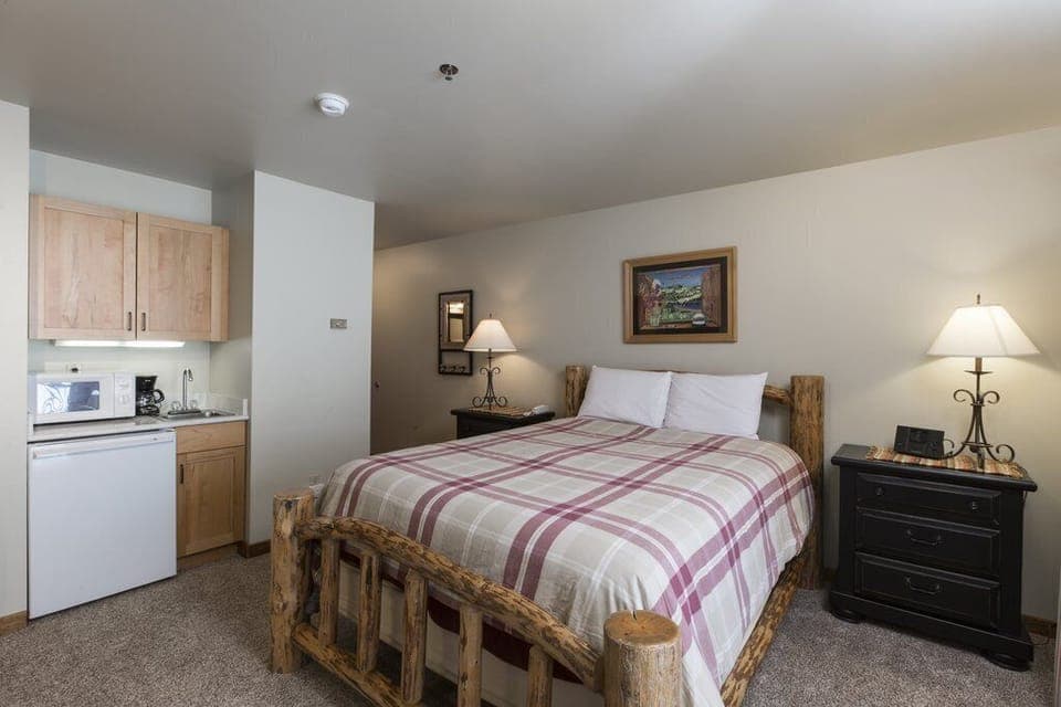 Has a wet bar with microwave, mini refrigerator, and coffeemaker.