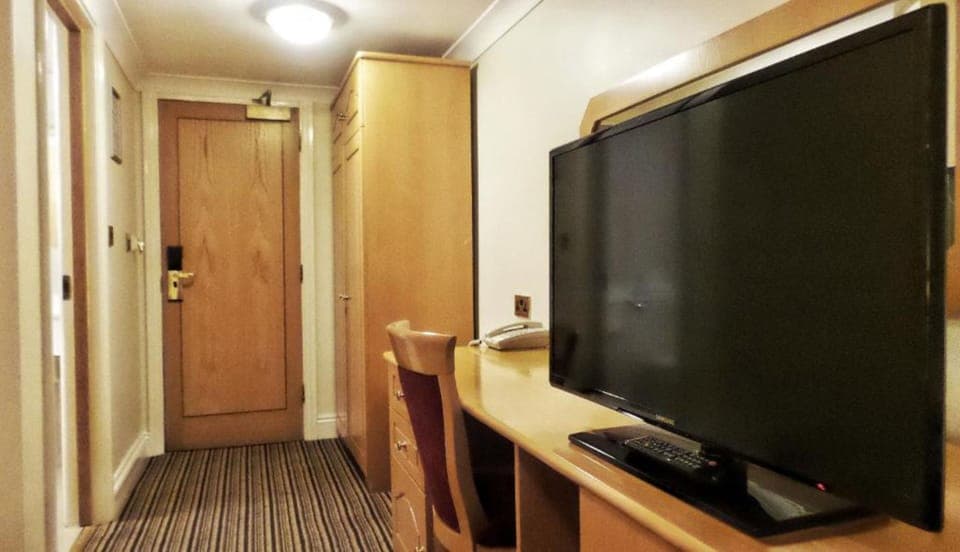 Desk, laptop workspace, free WiFi, bed sheets