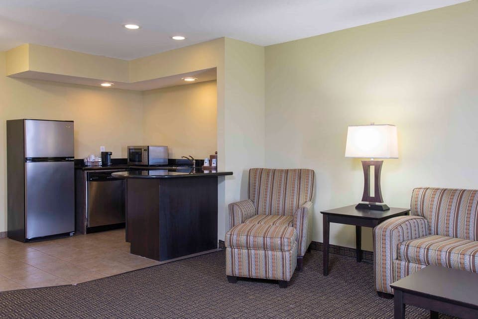 Suite, Two Queen Beds, Non-Smoking | In-room safe, blackout drapes, iron/ironing board, free rollaway beds