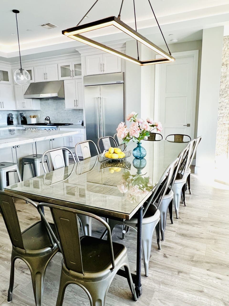 Interior dining plus nearby bar stools.