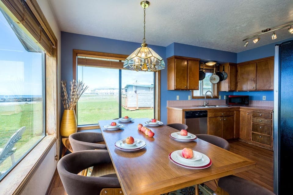 The charming kitchen enjoys an amazing ocean view as well.