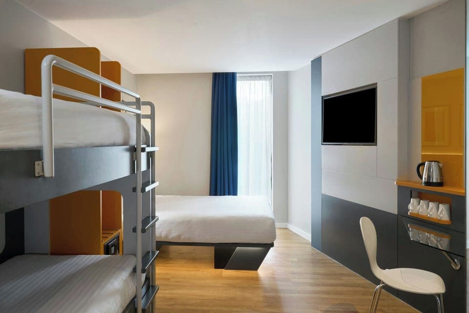 Family Room, 1 Double Bed | Desk, laptop workspace, blackout drapes, iron/ironing board