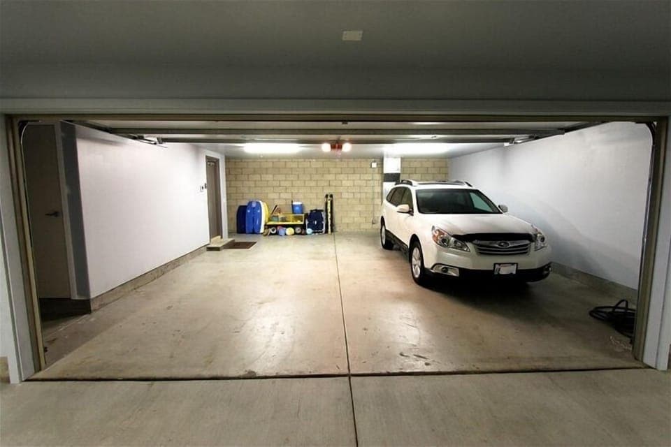 private, secure , oversize garage with boogie boards, chairs, beach toys etc