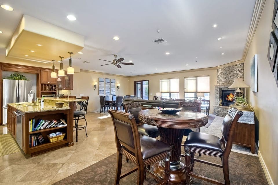 another vantage point of the large living room, gourmet kitchen and great room.