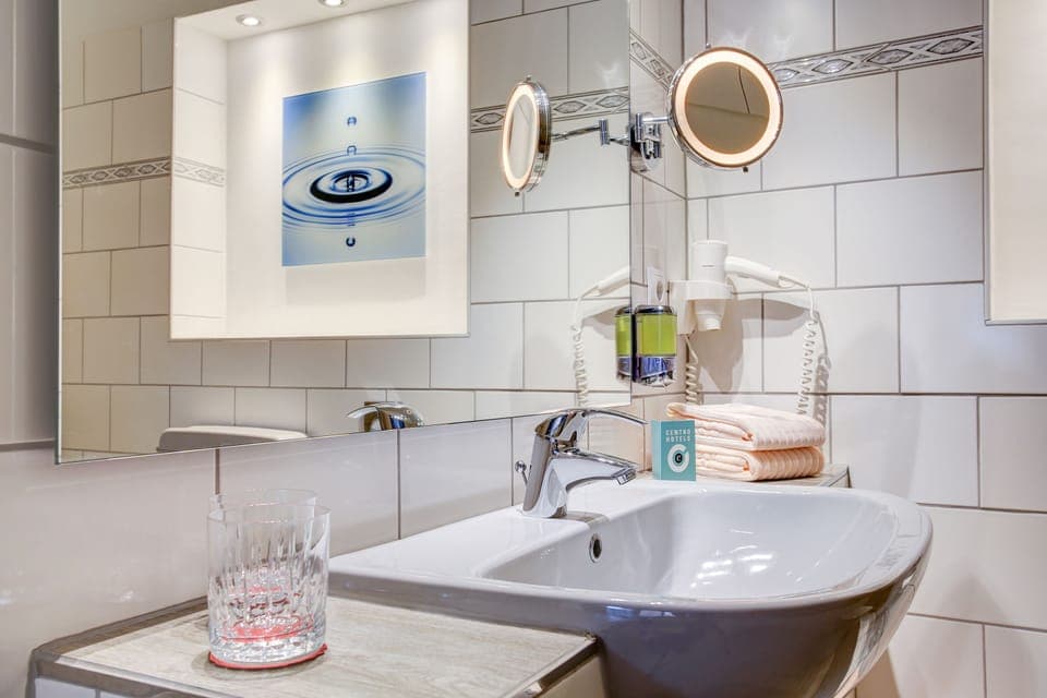 Hair dryer, towels, soap, shampoo