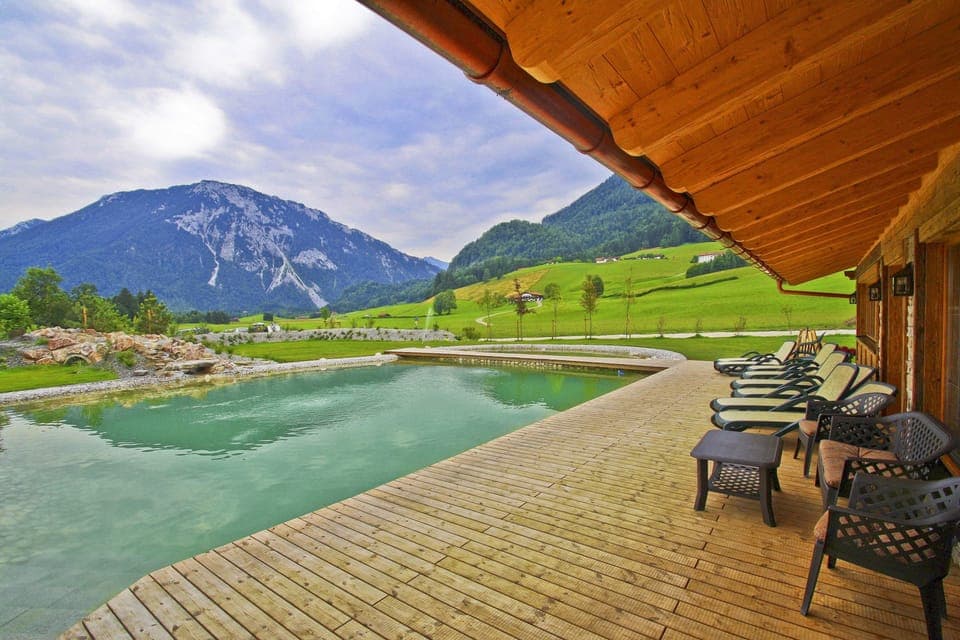 Outdoor pool, a natural pool, sun loungers