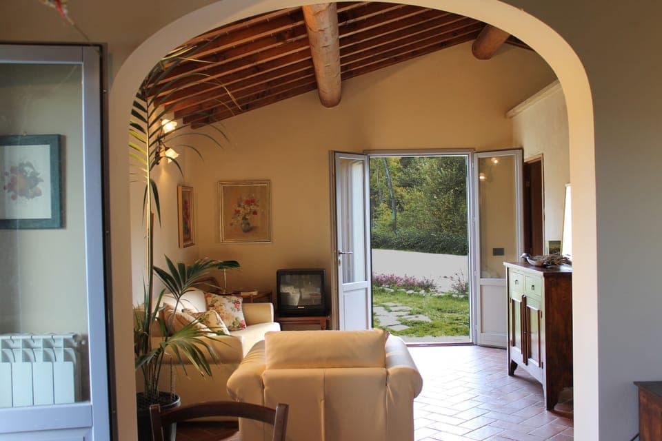 Family Apartment, 2 Bedrooms, Ground Floor (Marrone) | Living room | 32-inch flat-screen TV with satellite channels, TV, DVD player