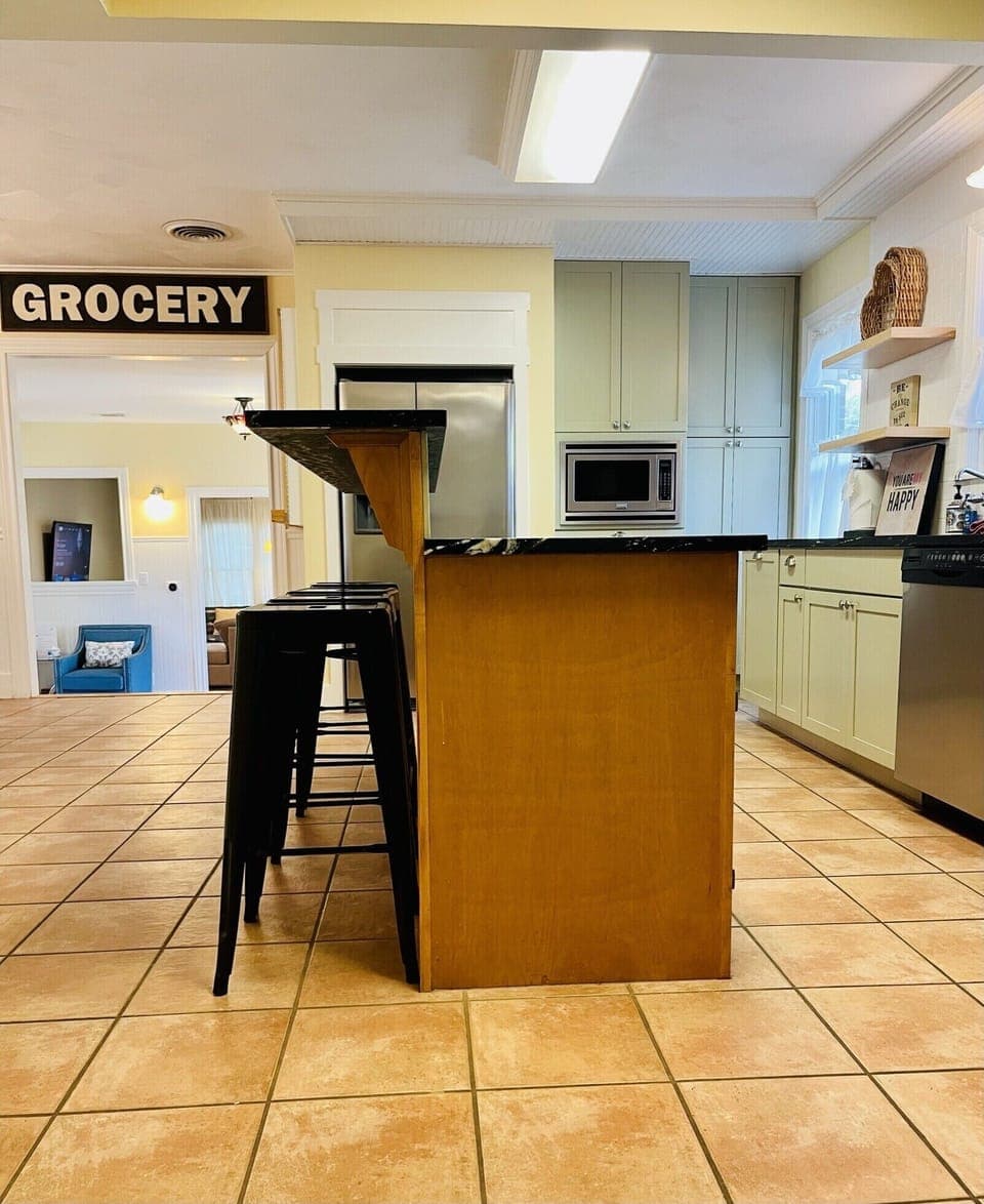 Chef's Kitchen with soap stone counter tops & stainless appliances