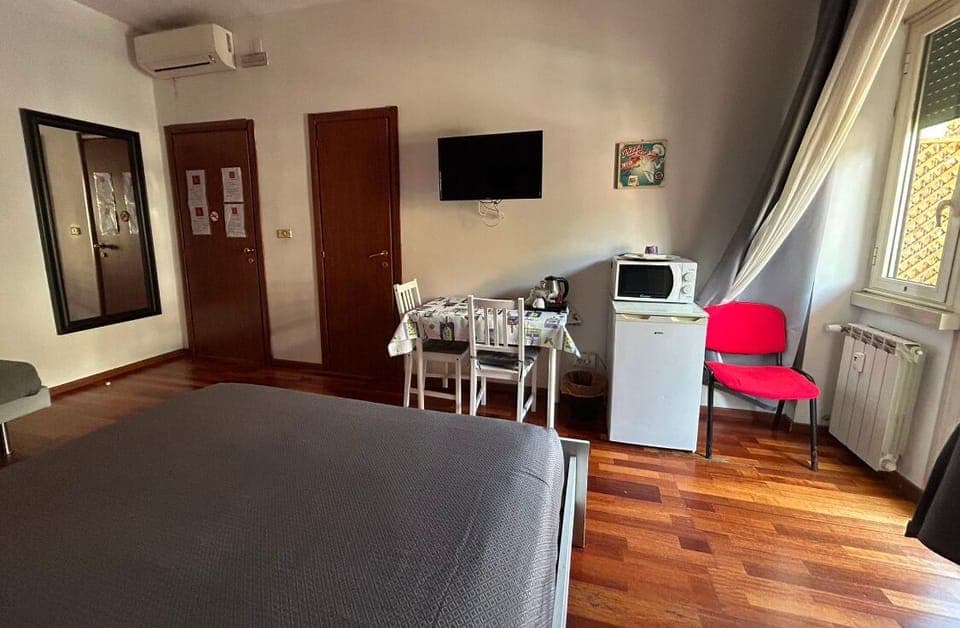 Superior Triple Room | 1 bedroom, down comforters, desk, laptop workspace