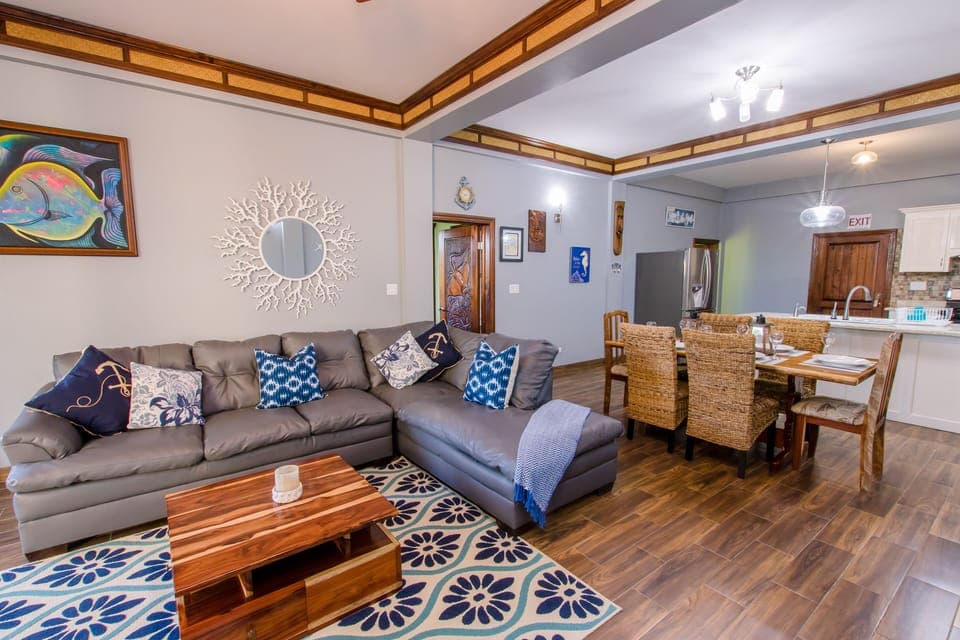 Living Area with 42' TV and floor to ceiling glass doors 