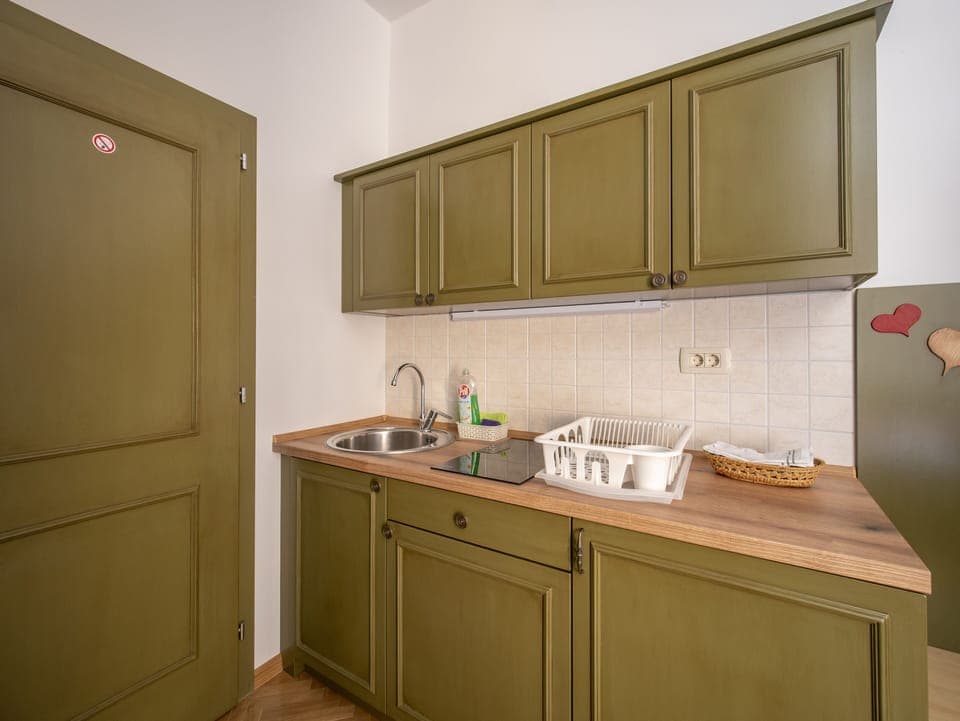 Studio (2 Adults) | Private kitchen | Fridge, coffee/tea maker, electric kettle, dining tables