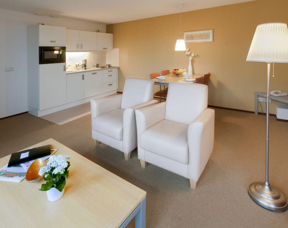 Apartment, 1 Bedroom | Living area | Flat-screen TV