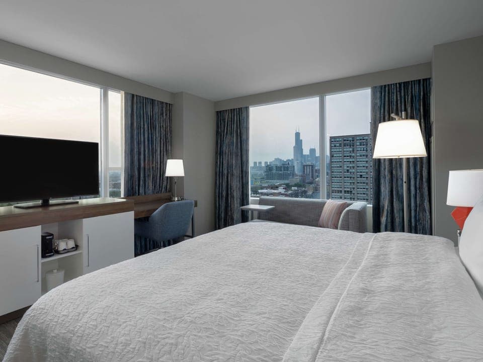 Premium bedding, desk, iron/ironing board, free cribs/infant beds