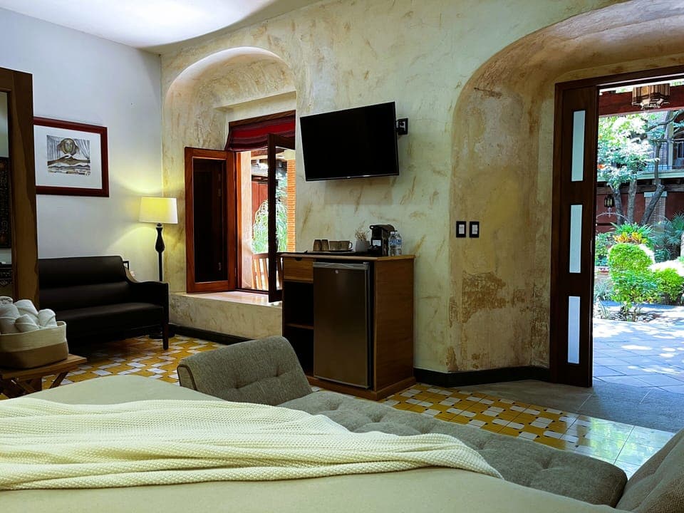 Family Suite, 2 Bedrooms (Morales) | Living area | 55-inch flat-screen TV with cable channels, TV