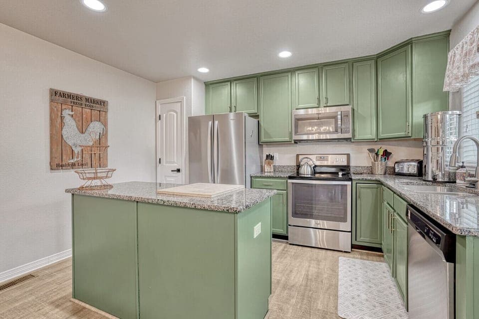 Kitchen with microwave, oven, and dishwasher