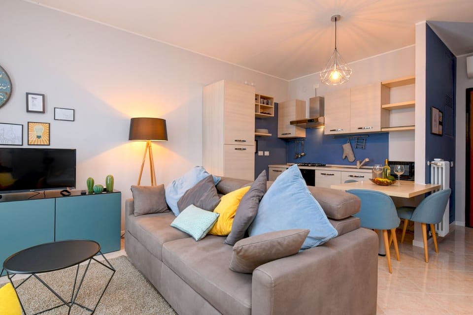 Large living room with Smart TV and  sofa