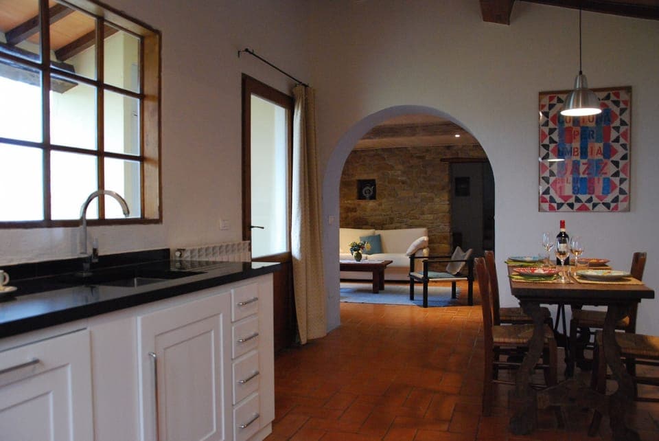 The Kitchen and dining area leading to the downstairs sitting room
