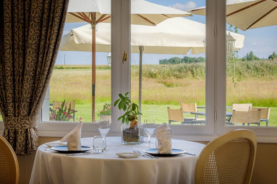 Breakfast, dinner served; French cuisine, garden views 