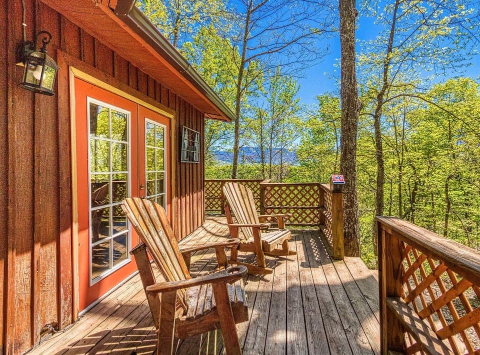 Rock your cares away on the front deck overlooking the mountains.