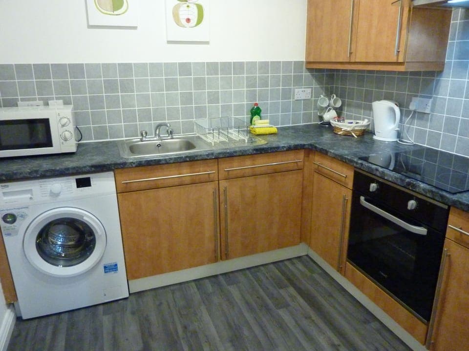 Modern Kitchen with Ceramic Hop, Oven, Washing Machine, Microwave and much more.